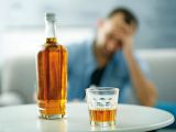 Man struggling with alcohol addiction